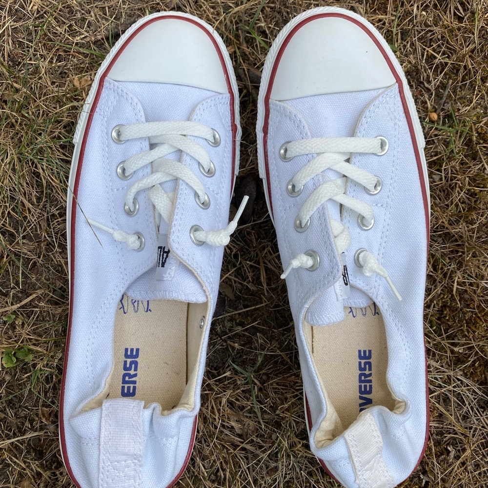 White low top converse all stars slip ons size 10.